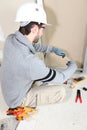 Electrician wiring a room Royalty Free Stock Photo