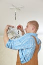 Electrician at wiring work Royalty Free Stock Photo