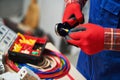 Electrician work with cable. crimping pliers in use Royalty Free Stock Photo