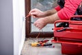 Electrician at work, home renovation, electrical installation, Hand of an electrician, handyman at work