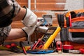 Electrician at work on a residential electrical system. Electricity Royalty Free Stock Photo