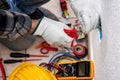 Electrician at work on a residential electrical system. Electricity Royalty Free Stock Photo