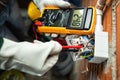 Electrician at work on a residential electrical system. Electricity Royalty Free Stock Photo