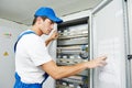 Electrician worker inspecting