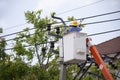 Electrician worker of Metropolitan Electricity Authority working repair electrical system on electricity pillar or Utility pole