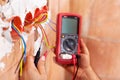 Electrician working - closeup on hands Royalty Free Stock Photo