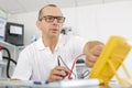 Electrician working on electric meter