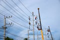 Electrician working on electric pole