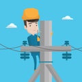 Electrician working on electric power pole.