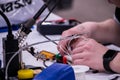 Electrician working on Electrical Components