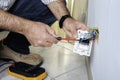 Electrician working in a residential electrical system Royalty Free Stock Photo