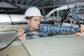 Electrician working in roof space Royalty Free Stock Photo