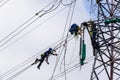 Electricians Hanging Tower Lines Repairs