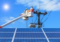 Electricians repairing wire of the power line on bucket hydraulic lifting platform with photovoltaics in solar power station