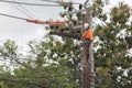 electricians repairing wire of the power line on electric power Royalty Free Stock Photo