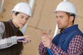 electricians talking about cables Royalty Free Stock Photo