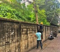 Electricians at work on outdoor power lines in Thailand