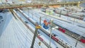 Electricians worked at autotower. Workers repair mast lighting. Aero view