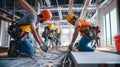 Electricians working on a complex wiring system inside a building under construction Royalty Free Stock Photo