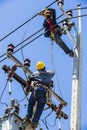 Electricians working on the electricity pole