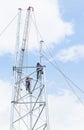 Electricians working in the height for installation antenna communication Royalty Free Stock Photo