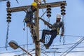 Electricians working together