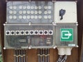 Electricity board in a greenhouse with a lot of old fashioned fuses
