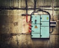 Electricity box on old wall Royalty Free Stock Photo