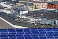 Solar panels and roofs of different houses