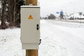 Electricity distribution box at the pole outside on the street Royalty Free Stock Photo