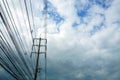 Electricity high voltage pylon and white blue sky Royalty Free Stock Photo