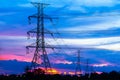 Electricity Pillars against colorful sunset Royalty Free Stock Photo