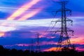 Electricity Pillars against colorful sunset Royalty Free Stock Photo