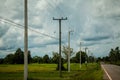 Electricity poles are located on the electric field Royalty Free Stock Photo