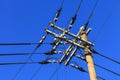 Electricity post with clear blue sky