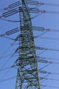 Electricity pylon against blue sky Royalty Free Stock Photo