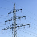 Electricity pylon close-up power pole high voltage against blue sky Royalty Free Stock Photo