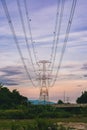 An electricity pylon is known as an overhead line pylon. high-voltage power lines at sunset. Royalty Free Stock Photo