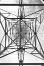 Electricity pylon metal structure bottom-up in architectural perspective Royalty Free Stock Photo