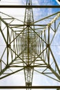 Electricity pylon metal structure bottom-up in architectural perspective Royalty Free Stock Photo