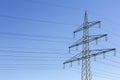 Electricity pylon power pole high voltage against blue sky Royalty Free Stock Photo