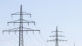 Electricity pylon power pole high voltage against blue sky Royalty Free Stock Photo