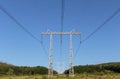 Electricity pylon power pole high voltage against blue sky Royalty Free Stock Photo