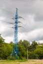 Electricity pylon silhouetted against cloud sky background. High voltage tower Royalty Free Stock Photo