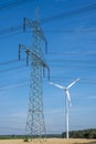 Electricity pylon, wind turbine and power cables