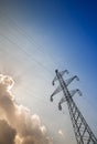 Electricity pylons with blue sky background