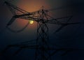 Electricity pylons - silhouette at sunset.High voltage power lines Royalty Free Stock Photo