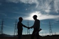 Electricity station handshake Royalty Free Stock Photo