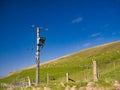 An electricity supply pylon delivering rural power through the UK national grid