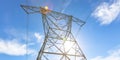 Electricity tower under a sunny sky with clouds Royalty Free Stock Photo